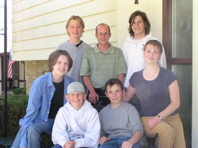 7 Cousins on porch-.JPG